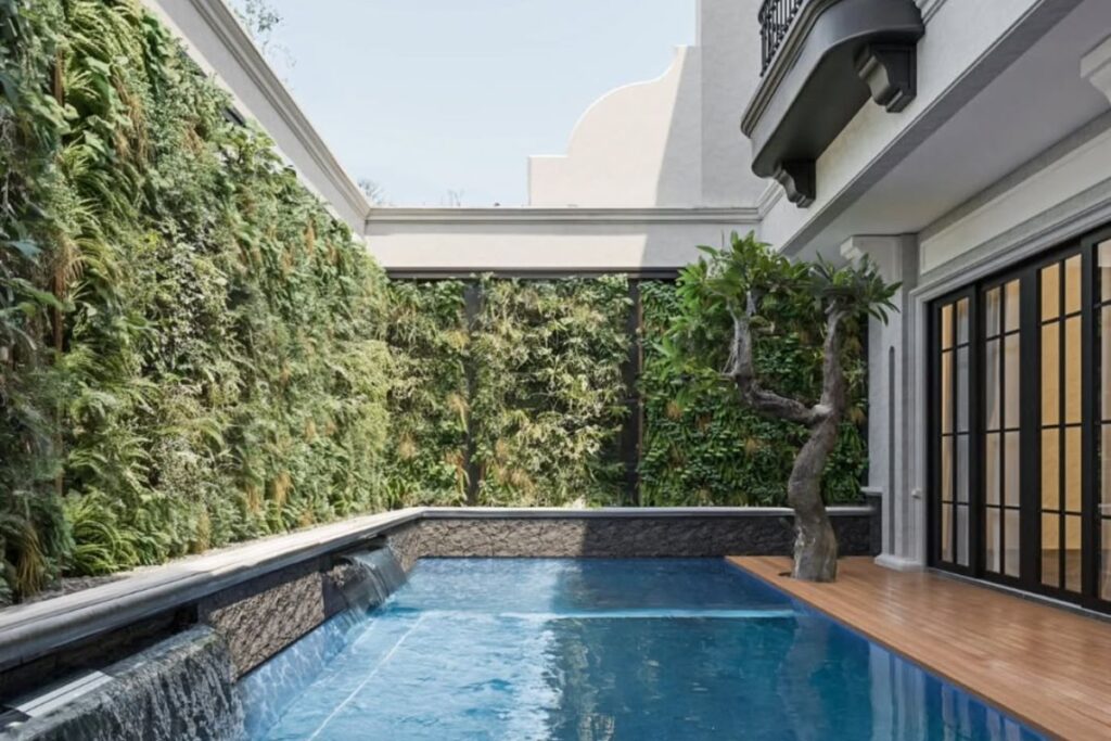 Rumah yang ada Kolam Renang dan Taman